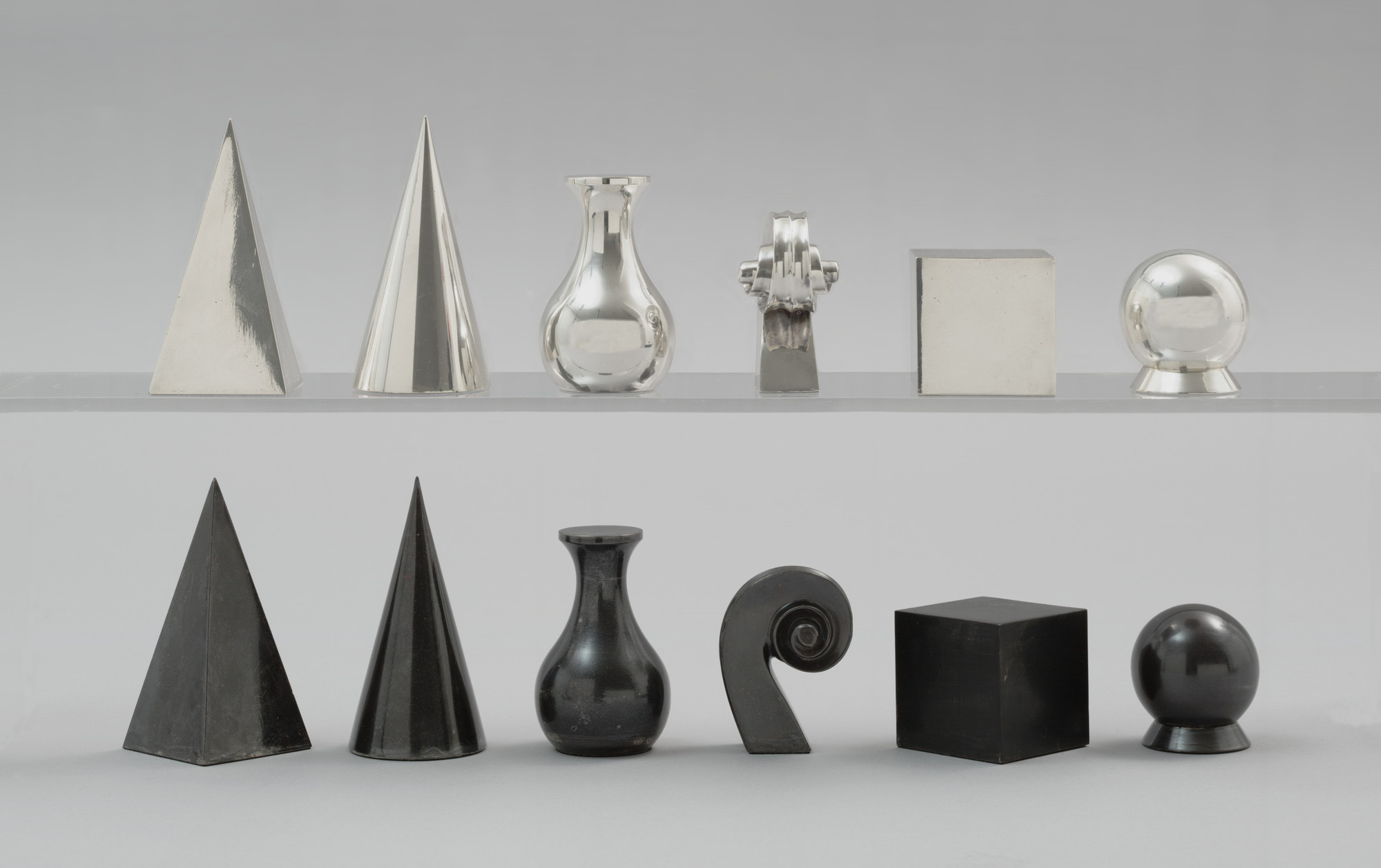 Man Ray chess set, MoMA silver-plated brass
